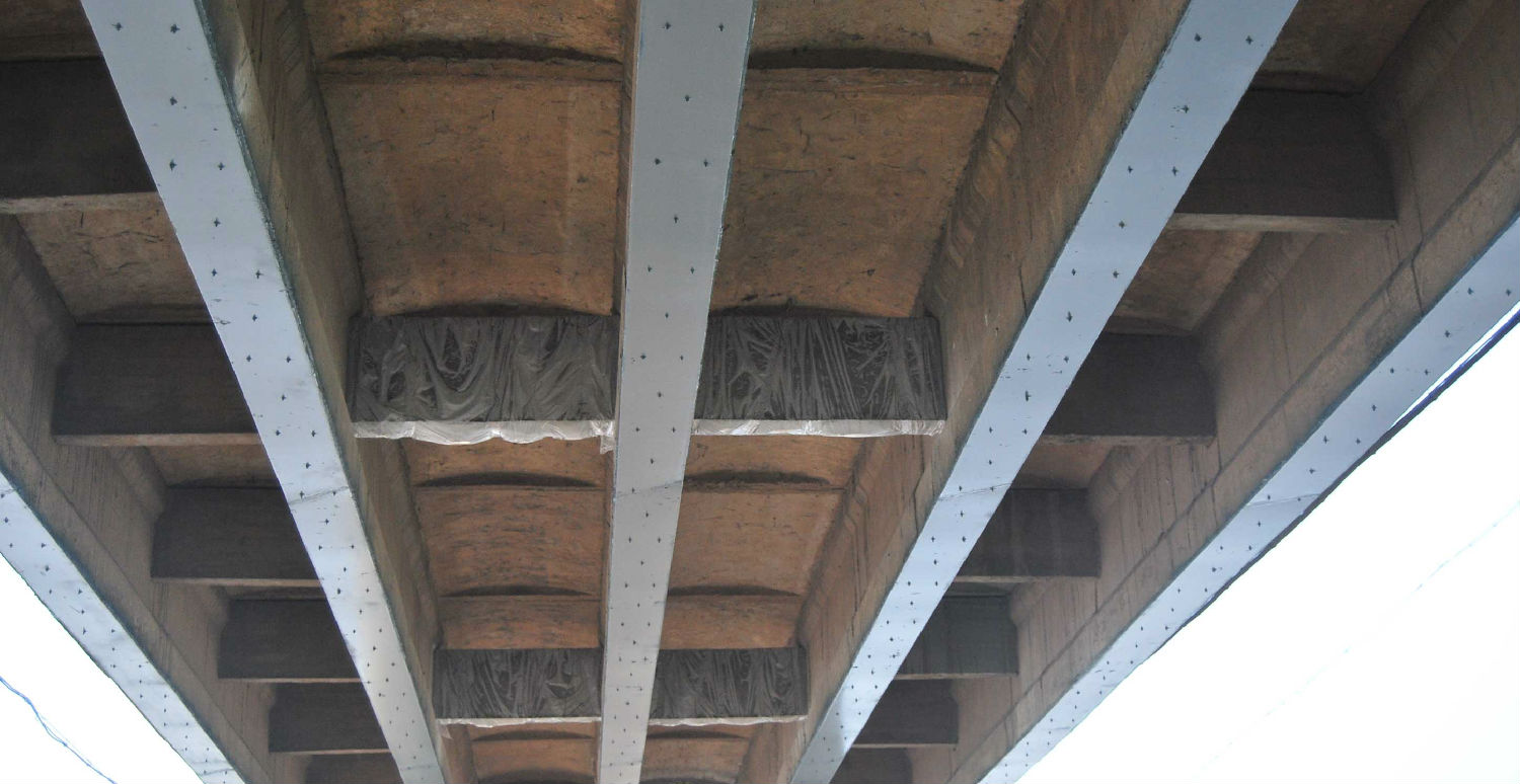 粘钢加固.jpg 粘钢加固.jpg