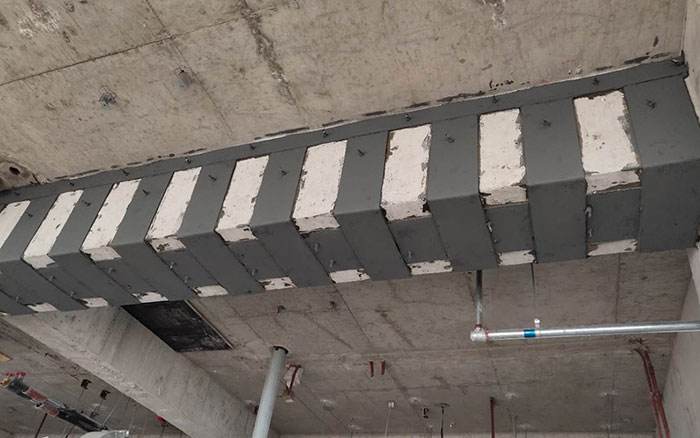 怎么用碳纤维布对建筑结构加固？